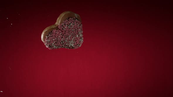 Doughnuts falling and bouncing in ultra slow mo 1500fps - reflective surface - DOUGHNUTS PHANTOM 