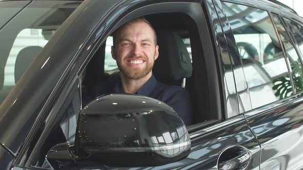 Happy Caucasian Man Now the Owners of New Car