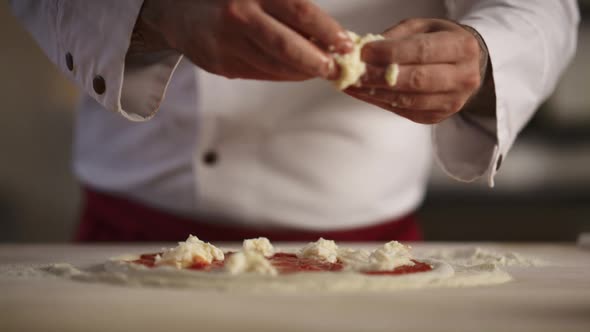 Pizza Chef Cooking Meal in Restaurant