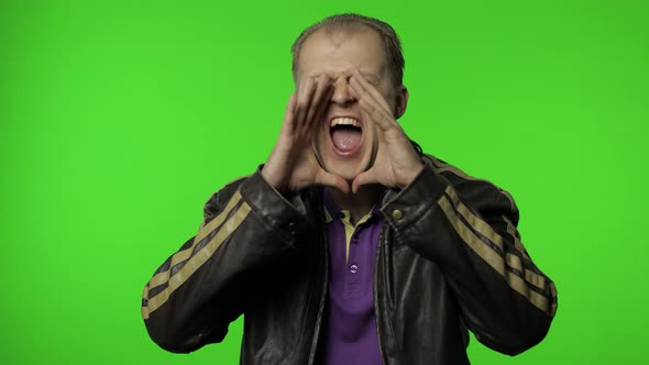 Expressive Rocker Man Screaming and Shouting. Studio Portrait of Handsome Person on Chroma Key