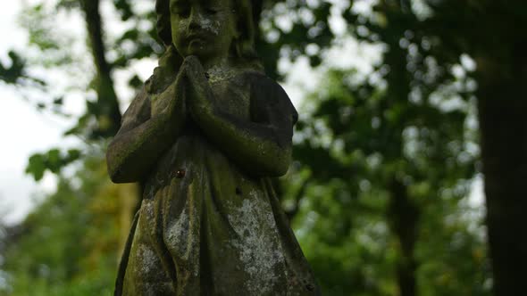 Downward shot of cemetery statue