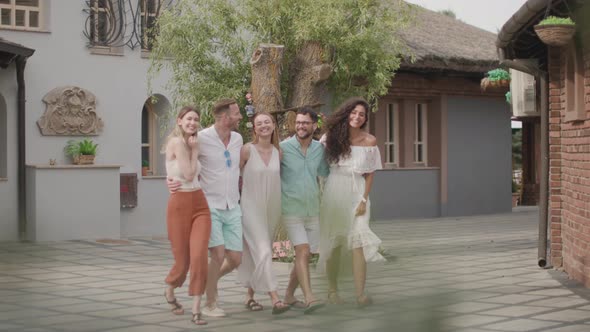 Group of happy young people having fun outdoors