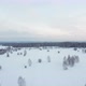 Drone flies over the field in winter - VideoHive Item for Sale