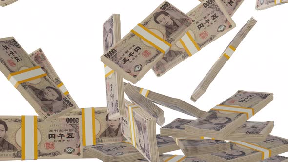 Many wads of money falling on table. 5000 Japanese Yen banknotes.