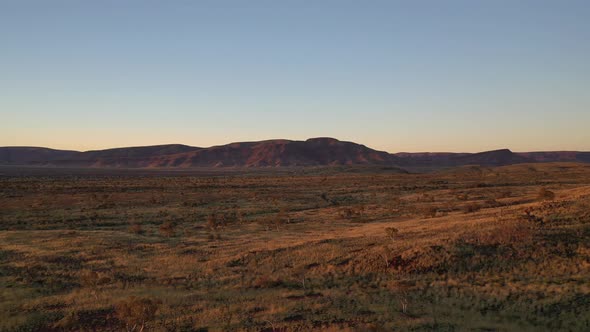 Summit of Mt Bruce, Karijini National Park, Western Australia Sunrise Sunset 4K Aerial Drone