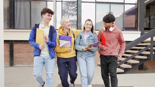 Multi Ethnic Group of Confident and Happy College Student Friends Going Back to Classes Arriving to