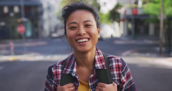 Mixed race woman smiling at the camera