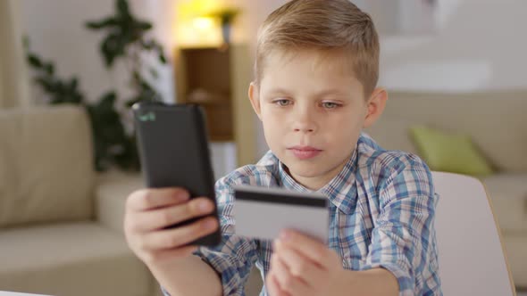 Boy Shopping Online in Smartphone App