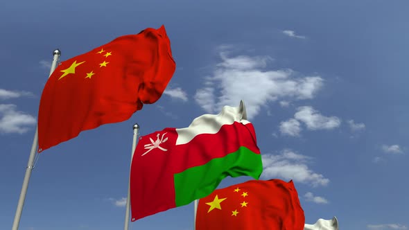 Flags of Oman and China at International Meeting