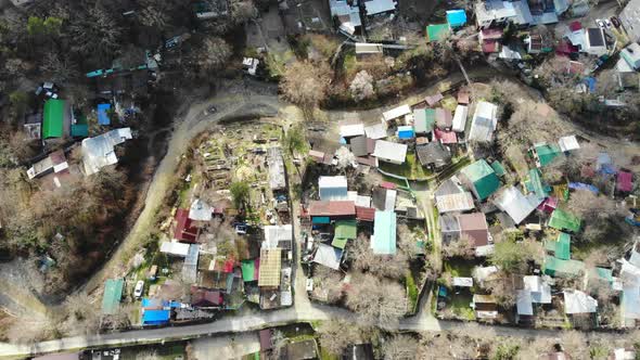 Village in the caucasian mountains. Mountain paths in the forest.