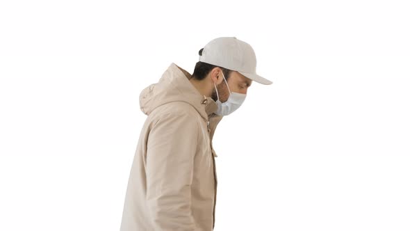 Adult Man in Jacket and in Medical Mask Running on White Background