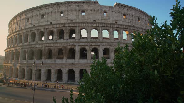 Rome Colosseum and crowded street of Rome , Italy