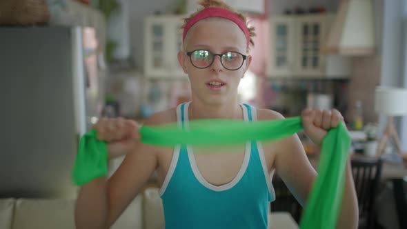 Cute Funny Young Gay Man Wearing Glasses And Bright Sportswear