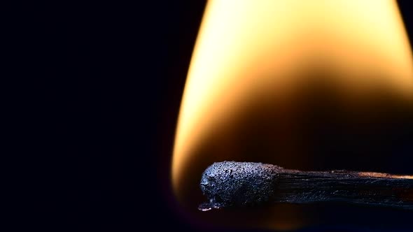 wooden match igniting after being heated up