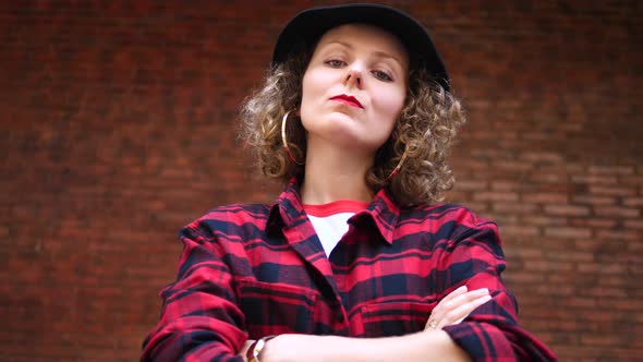 Hipster Female Portrait Looking In Camera Wearing Plaid Flannel Shirt