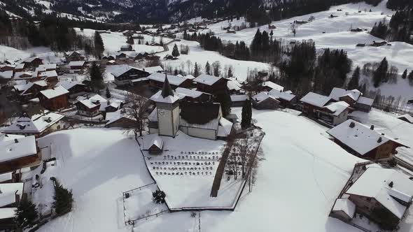 Aerial of buildings and a church in Gstaad