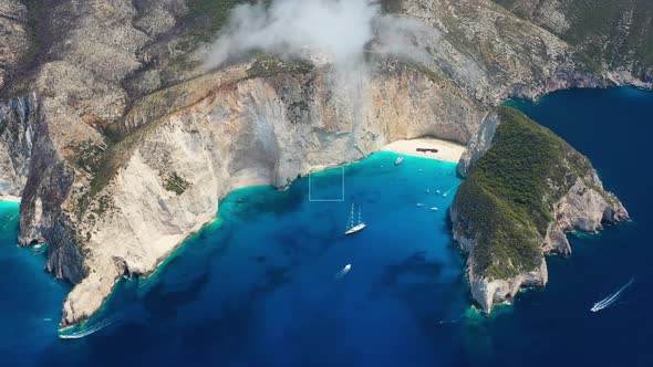 View of Navagio beach, Zakynthos Island, Greece. Aerial landscape. Blue sea water.