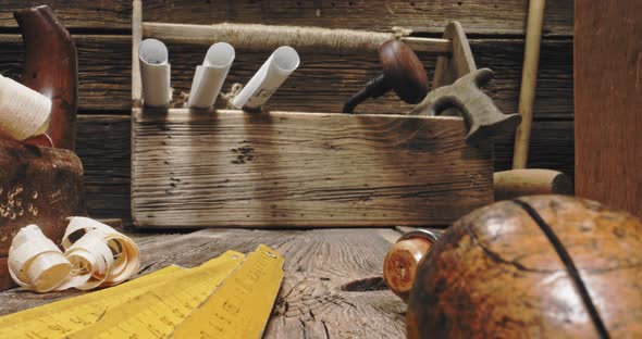 Vintage joinery workbench with tampers, chisels and planes. Carpentry tools.