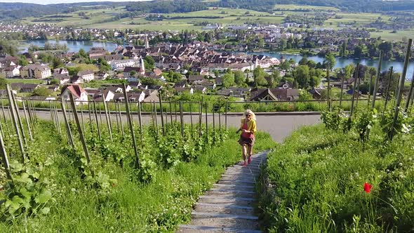 Woman Running in the Swiss Vineyards