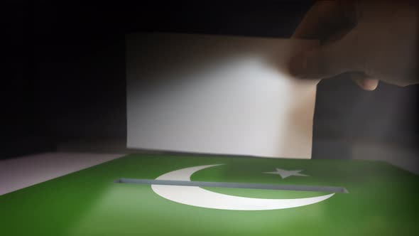 Digital Composite Hand Voting To National Flag OF Pakistan  alt