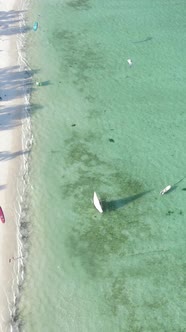 Boat Boats in the Ocean Near the Coast of Zanzibar Tanzania Slow Motion Vertical Video