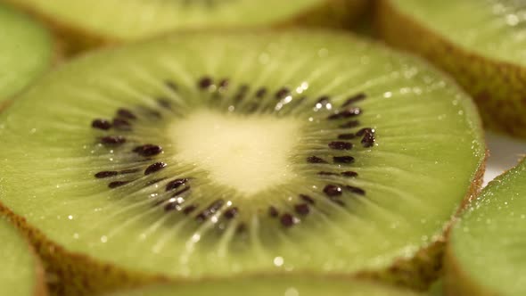 Kiwi Slices Closeup, Macro Food Summer Background, Fruits Top View. Rotate