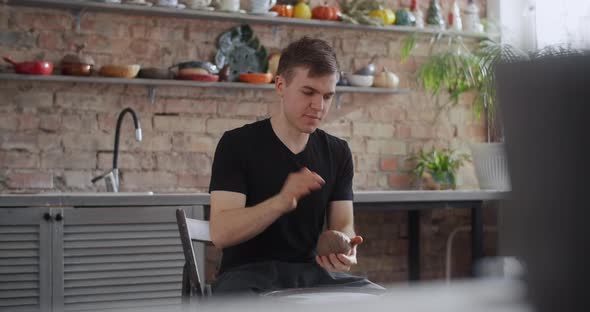 Potter Sculpts a Jug on a Potter's Wheel Video From Pottery Workshop Potter Makes Ceramics in Slow