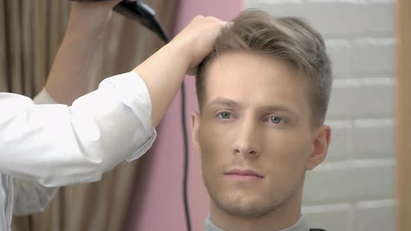 Barber Drying Hair Close Up