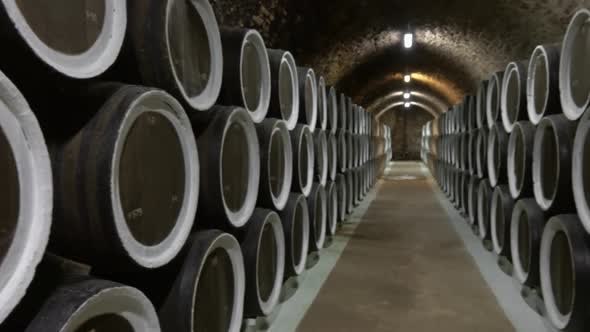Barrel Filled with Wine in Wine Cellar