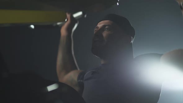 Fortitude Disabled Athlete in Wheelchair Lifting Blocks on Rack Machine Strength Training on Block