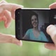 Young pretty woman takes selfie. Closeup hand holding phone. - VideoHive Item for Sale