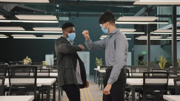 Two Colleagues Friends African Man Meet Arabian Coworker in Protective Medical Face Mask Greet