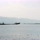 Silhouette Of People Sailing on Traditional Burmese Wooden Boat To Floating Village at Inle Lake - VideoHive Item for Sale