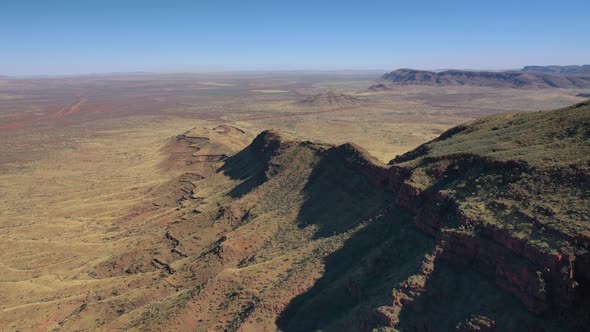 Summit of Mt Bruce, Karijini National Park, Western Australia Sunrise Sunset 4K Aerial Drone