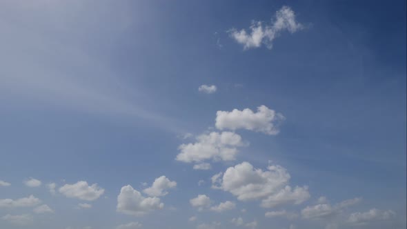 Time lapse of white cloud moving pass around sky background