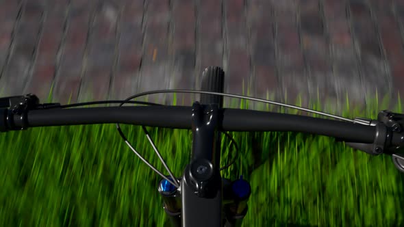 Outdoor cycling in changing seasons. Top view at the handlebars while driving.