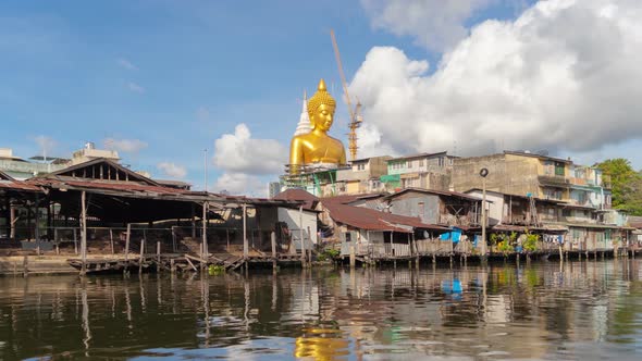 Time lapse of The Giant Golden Buddha in Wat Paknam Phasi Charoen Temple in Phasi Charoen