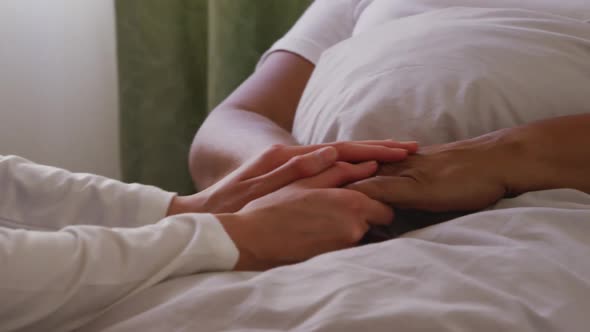 Nurse helping a senior woman in a retirement home