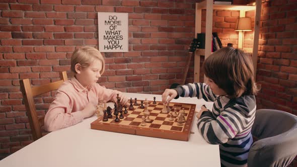 Two Boys Playing Chess