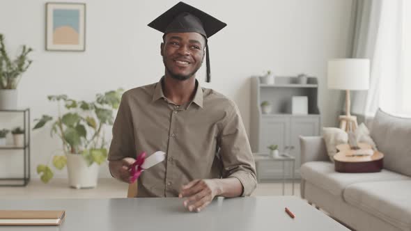 African Student Having Graduation Ceremony by Internet