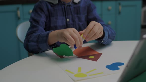 6 Years Old Boy Doing Art at Home