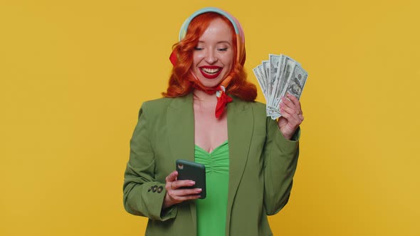 Happy Redhead Woman Looking Smartphone Display Sincerely Rejoicing Win Receiving Money Dollar Cash