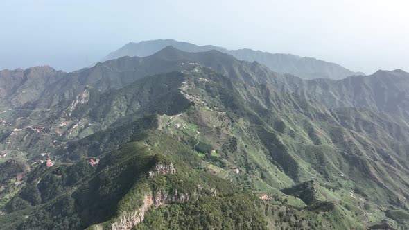 Aerial View of a Mountain Valley Forrest Landscape Misty Mountains Cliffs and Rocks Epic Landscape