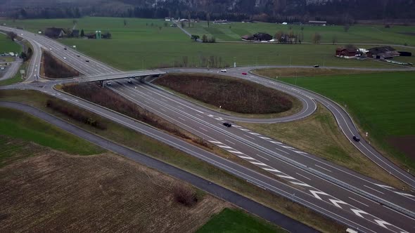 Overview of Motorway junction surrounded by green meadows