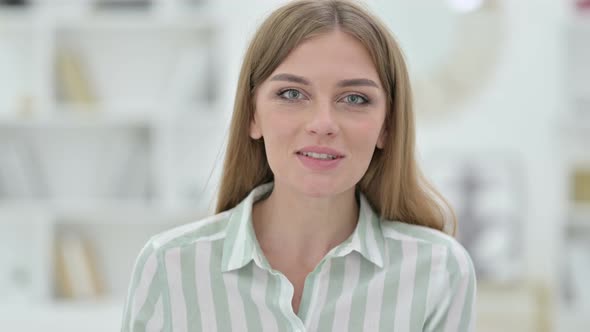 Portrait of Beautiful Young Woman Doing Video Chat