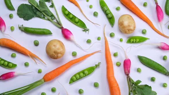 Vegetable Rotating Background of Potatoes Peas Carrots and Radishes Fashionable Vegetable Texture on