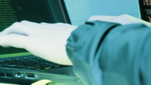 Closeup Shot of Human Hands Typing on Grey Keyboard