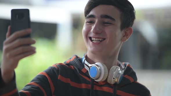 Young Handsome Iranian Teenage Boy in the Streets Outdoors