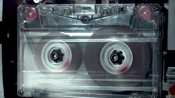 vintage audio cassette fast forwarding and then playback in tape deck