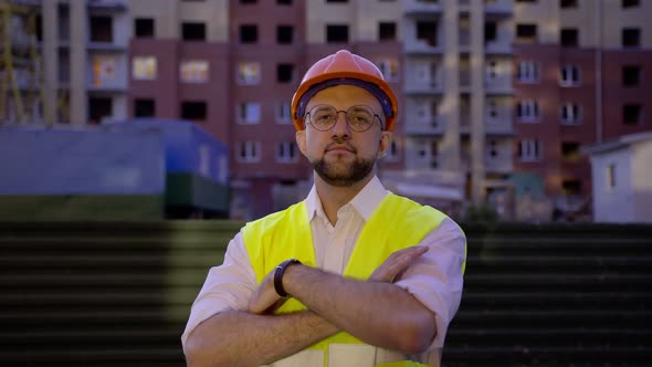 Worker Slowly Starts to Cross His Hands